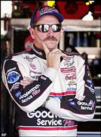 Dale Earnhardt looks out from the garage
