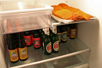 Fridge with beer and ribs