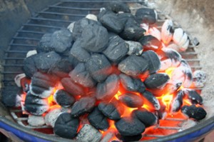 Kingsford charcoal warming up on July 4 in Weber Kettle Grill